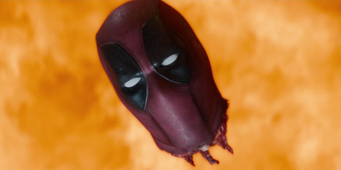 Deadpool's severed head flies towards the camera in an explosion in Deadpool 2