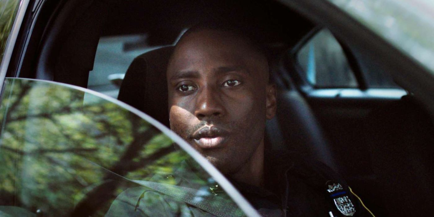 Dennis looking out the window of a car in Monster and Men