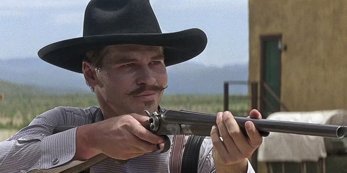 Doc Holliday aims a gun in Tombstone.