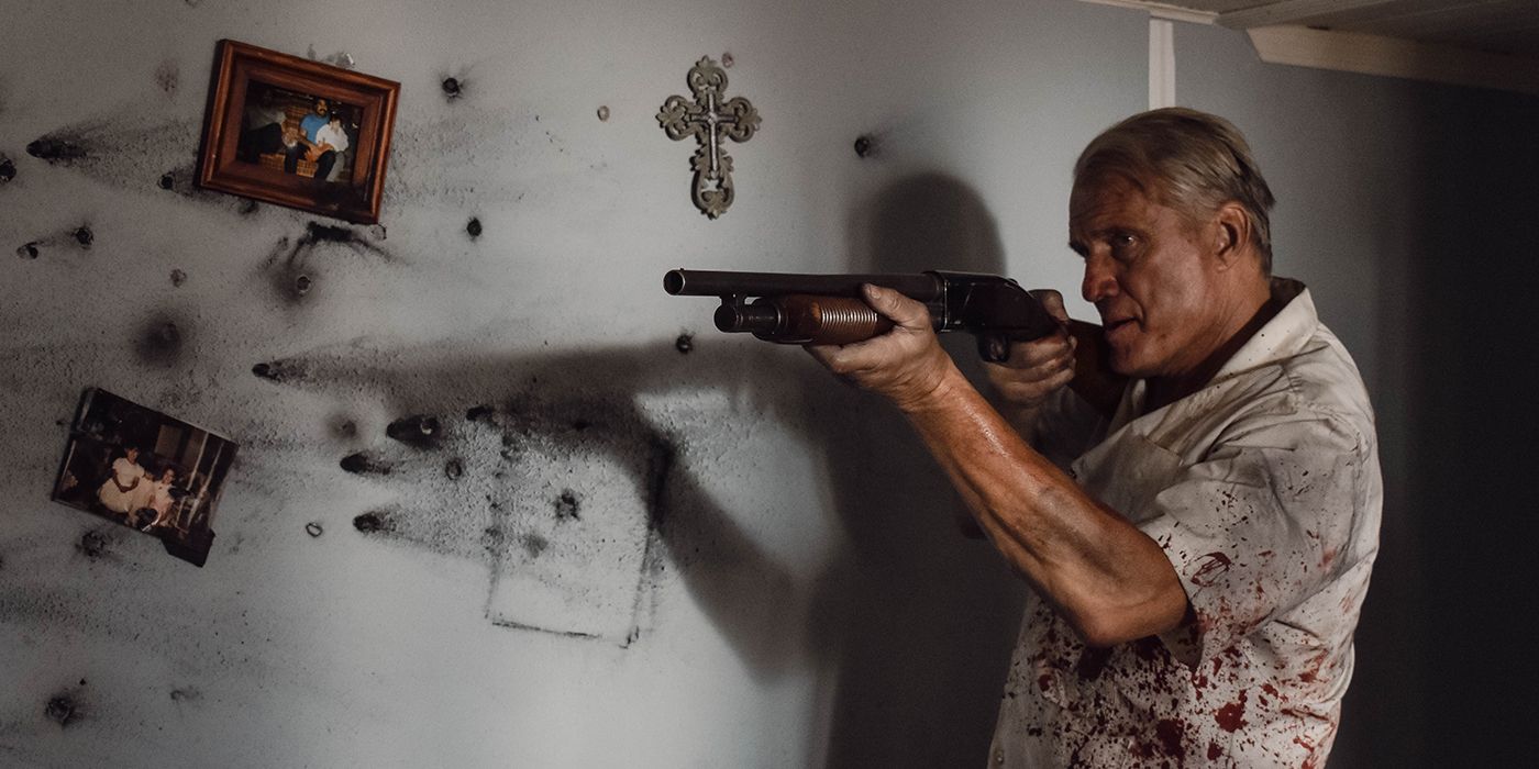 Dolph Lundgren as Johansen wielding shotgun in Wanted Man
