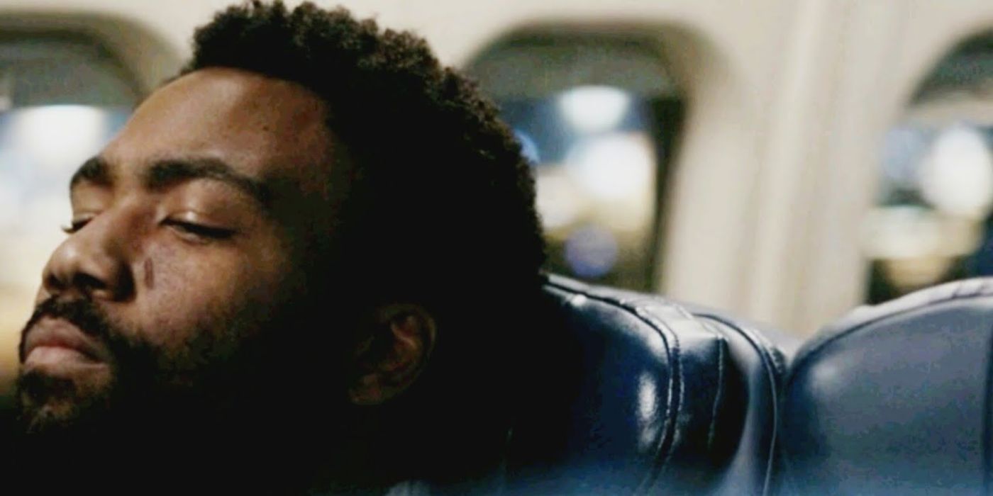 Earn (Donald Glover) closes his eyes on the flight to Europe in Atlanta season 2 episode 11 Crabs in a Barrel.