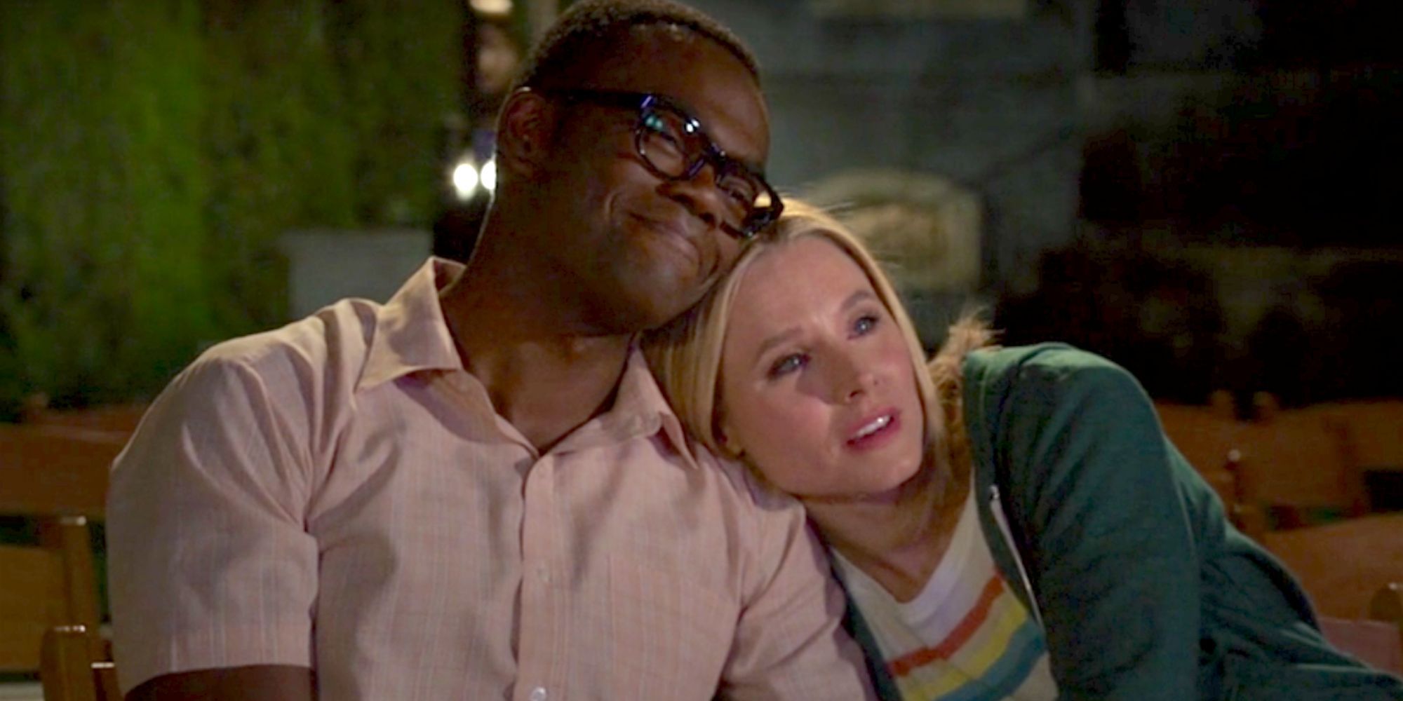 Eleanor and Chidi watching slideshow in The Good Place
