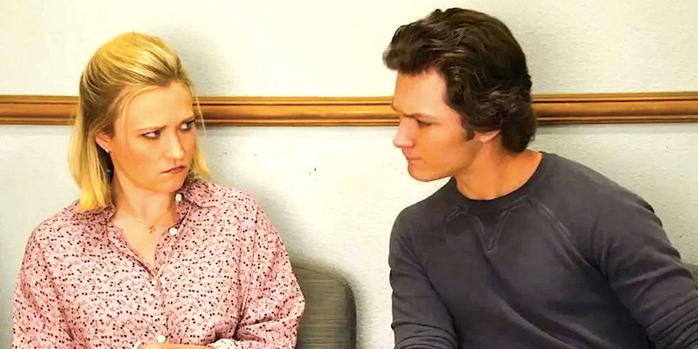 Emily Osment's Mandy frowns at Montana Jordan's Georgie as he sits and stares in Young Sheldon