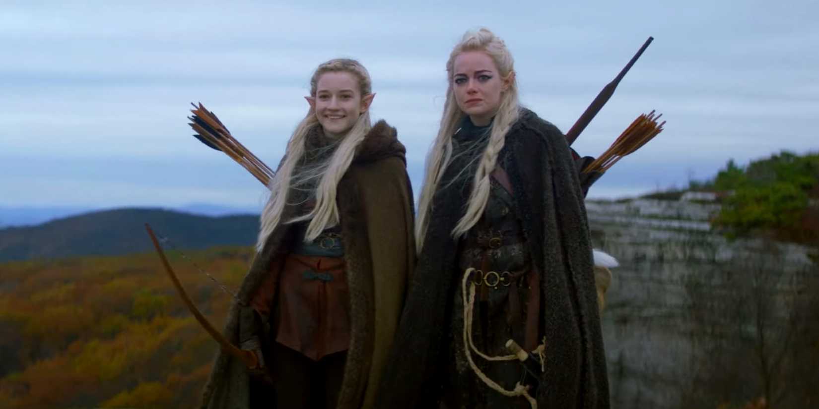 Emma Stone as Annie and Julia Garner as Ellie, both wearing elf costumes, in the Netflix show Maniac