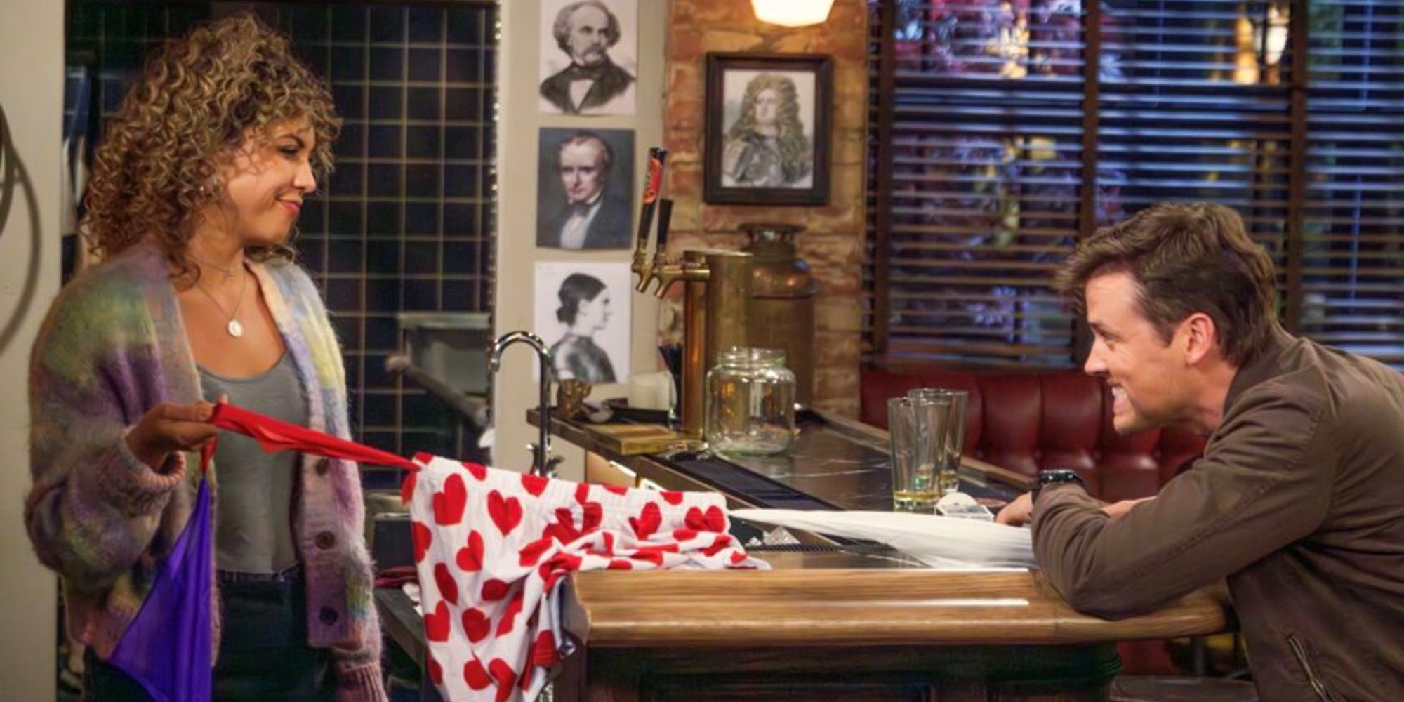 Eve and Freddy tug on laundry in Frasier