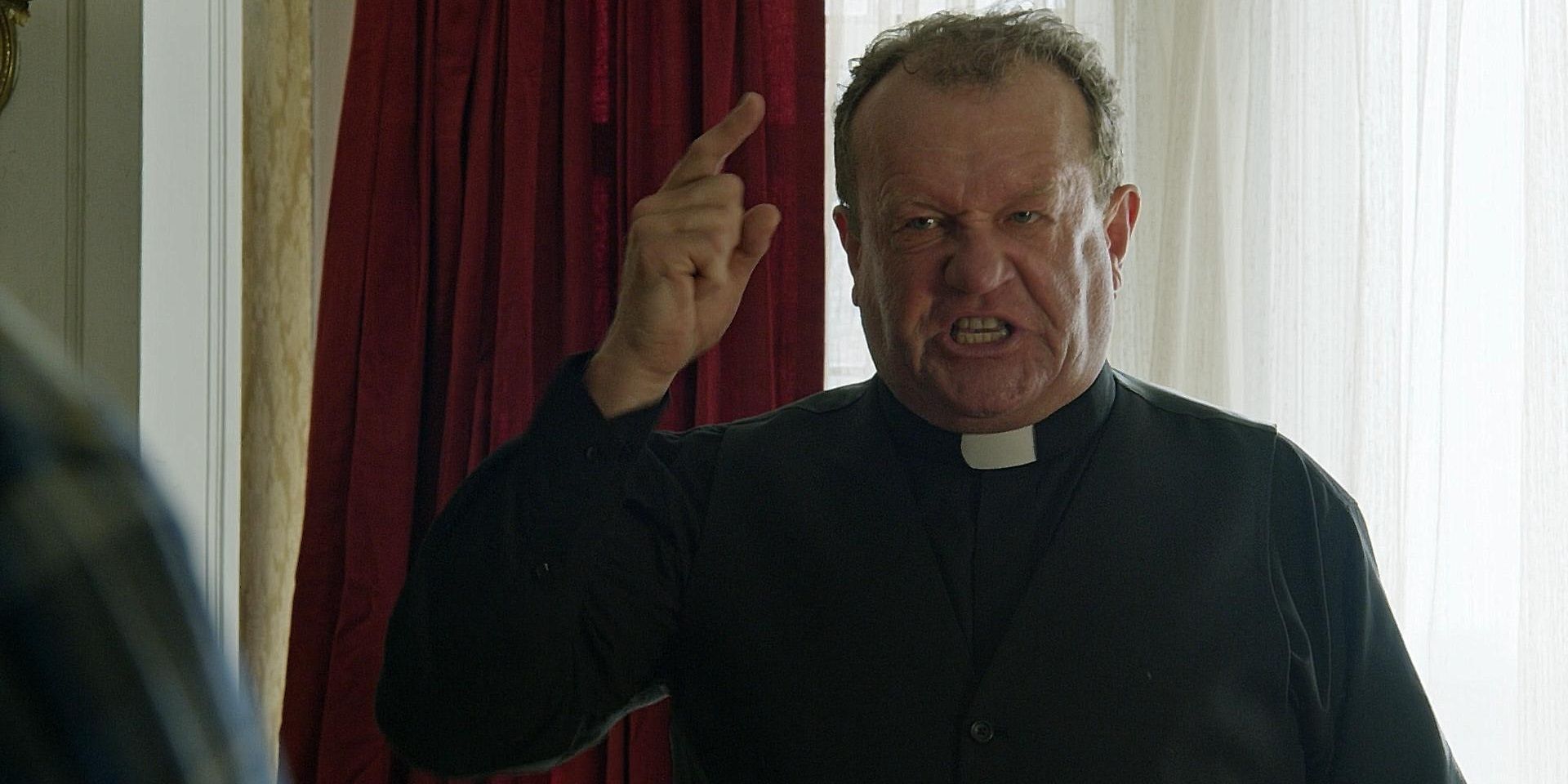 Father Michael looking angry in Loudermilk