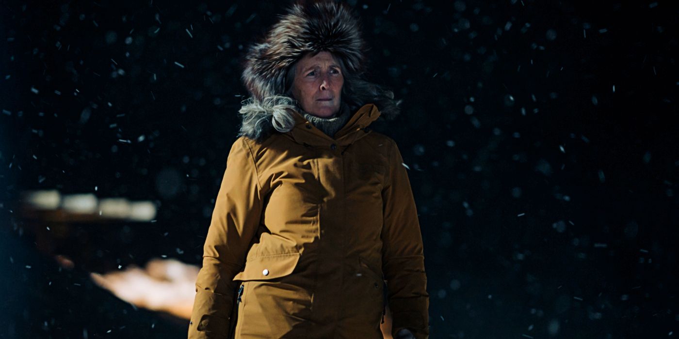 Fiona Shaw as Rose wears an orange-brown coat with fur hat in True Detective: Night Country.
