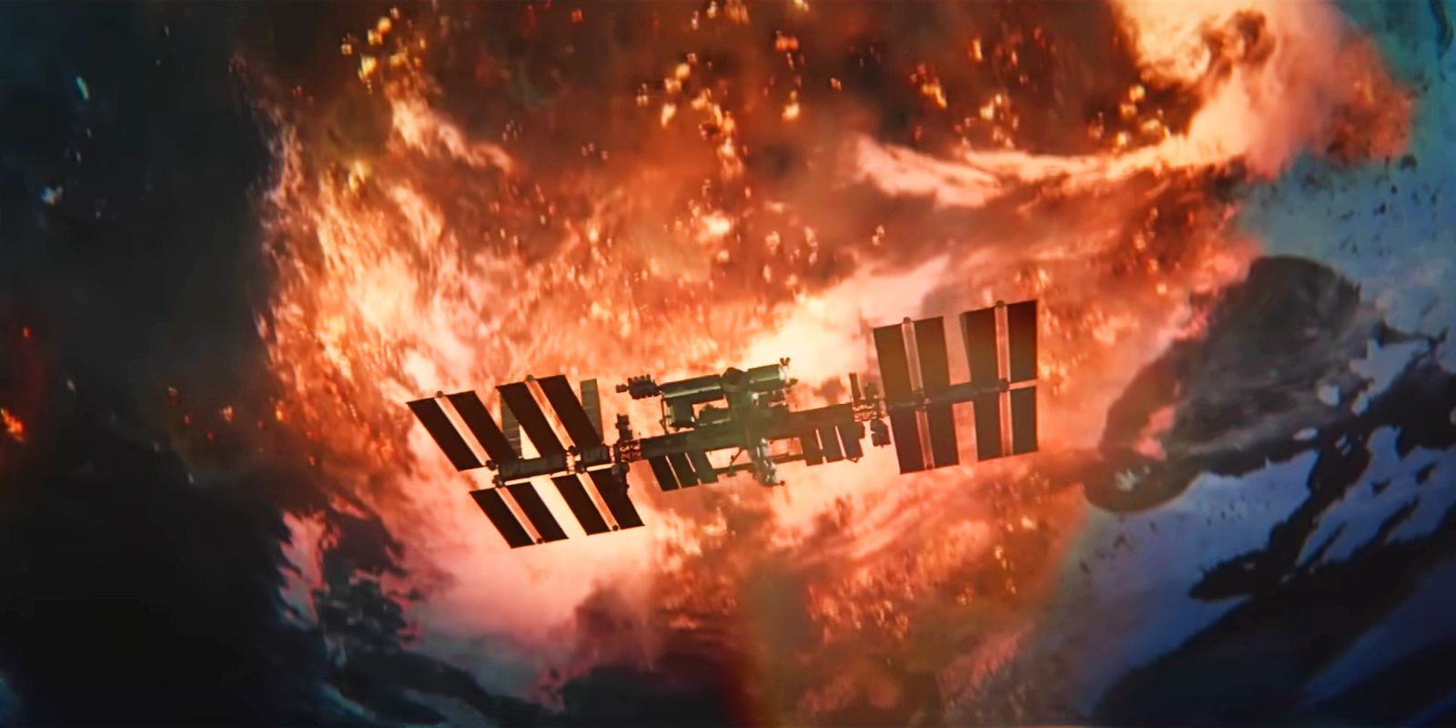 The Earth is on fire behind the International Space Station in the I.S.S.