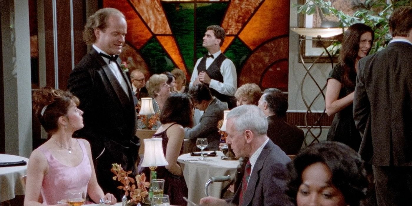Frasier standing up talking to Daphne and Martin in season 2 episode 23 of Frasier