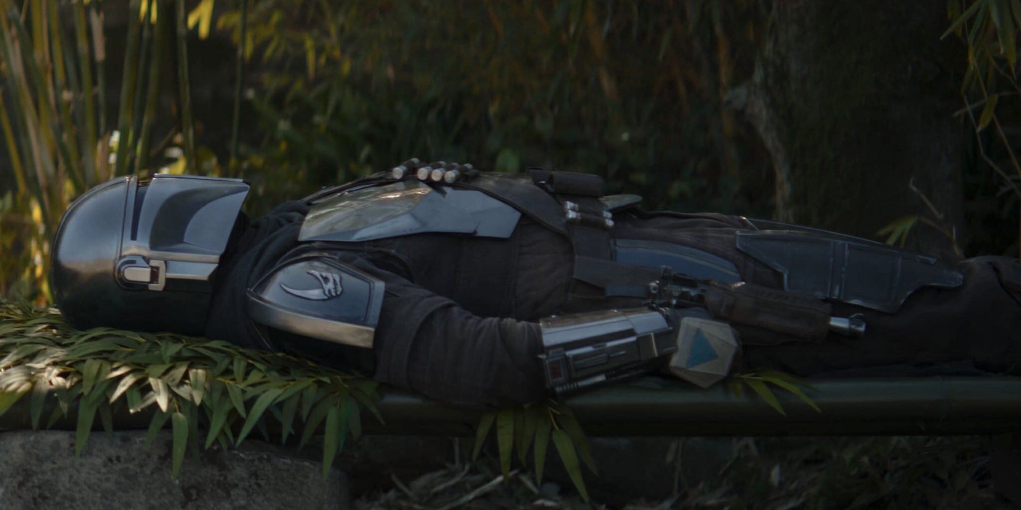 Din Djarin sleeping on a bench on Ossus in episode 6 of The Book of Boba Fett.