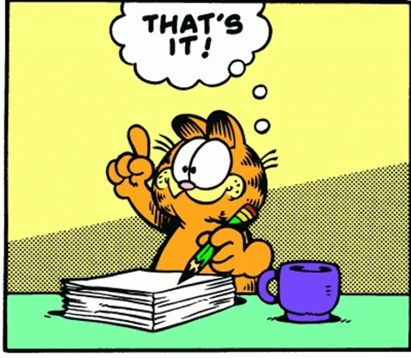 Garfield, pencil in paw, is struck by an idea, thinking: “That’s it!"