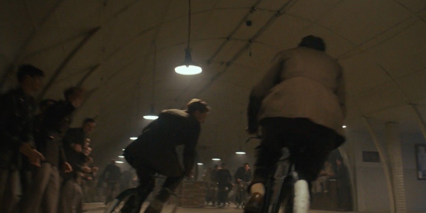 Gale Cleven and John Egan riding bikes Masters of the Air