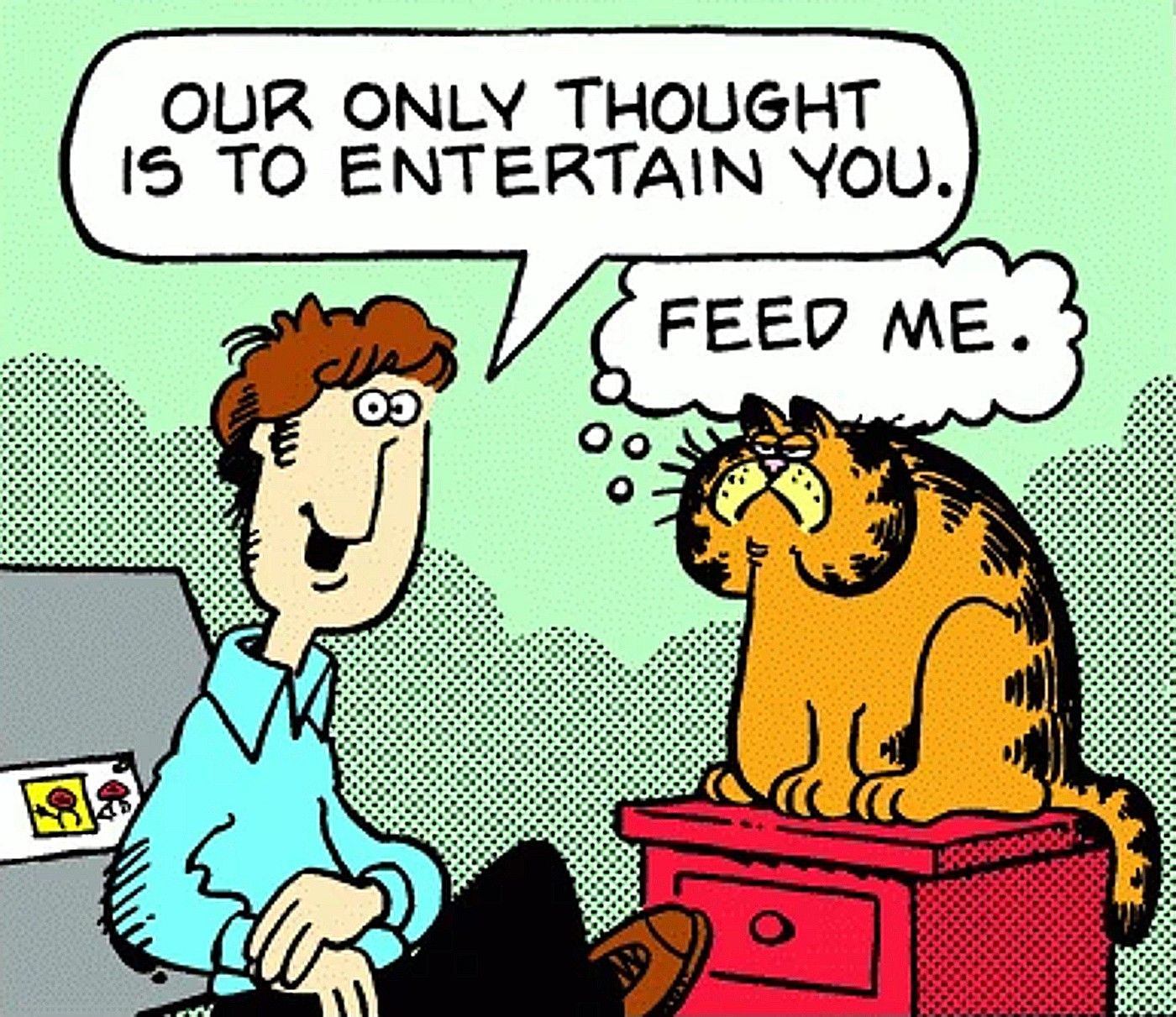 An early Garfield panel featuring primitive versions of Jon Arbuckle and Garfield
