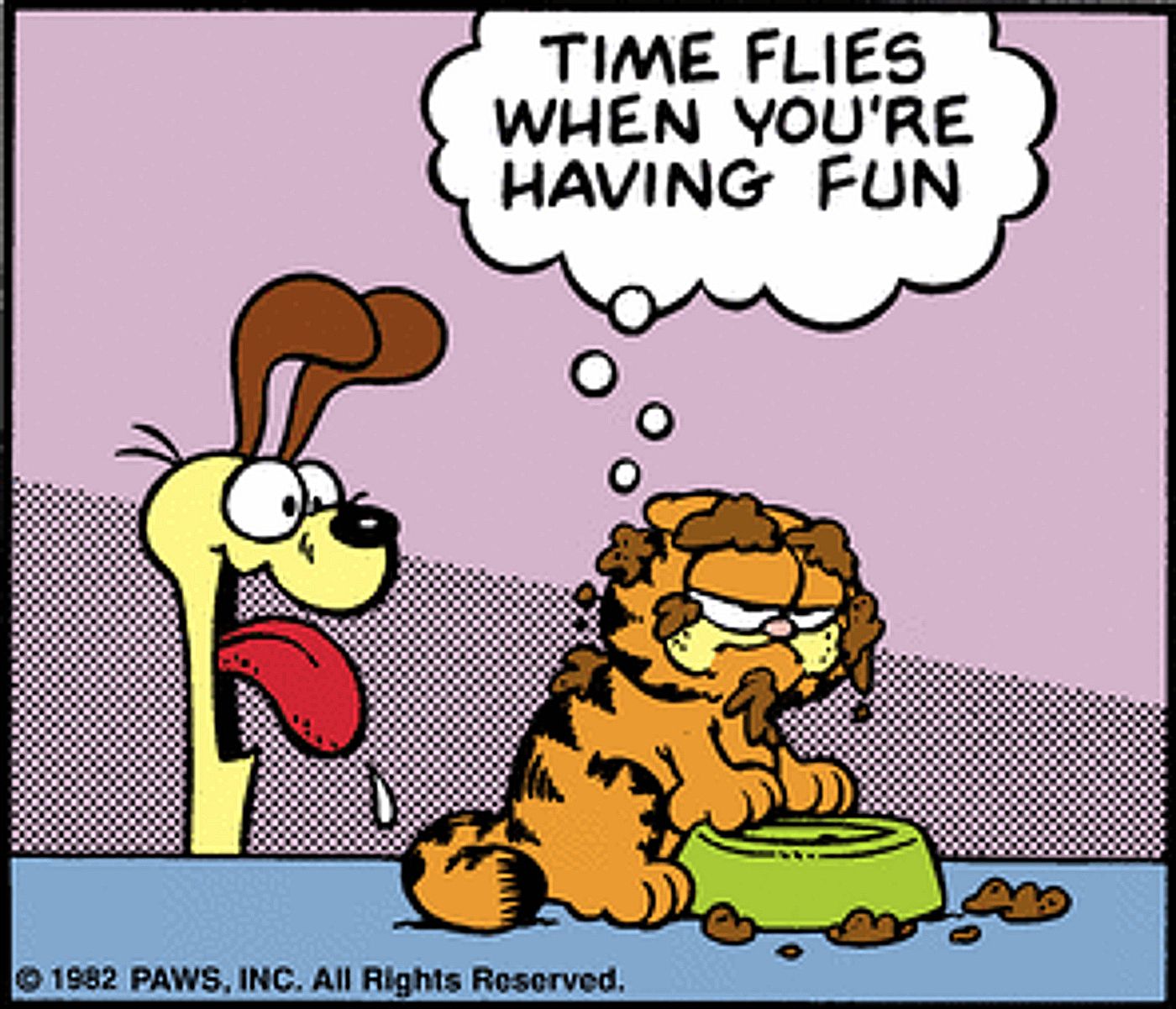 Garfield covered in dog food, saying “time flies when you’re having fun” while Odie looks on
