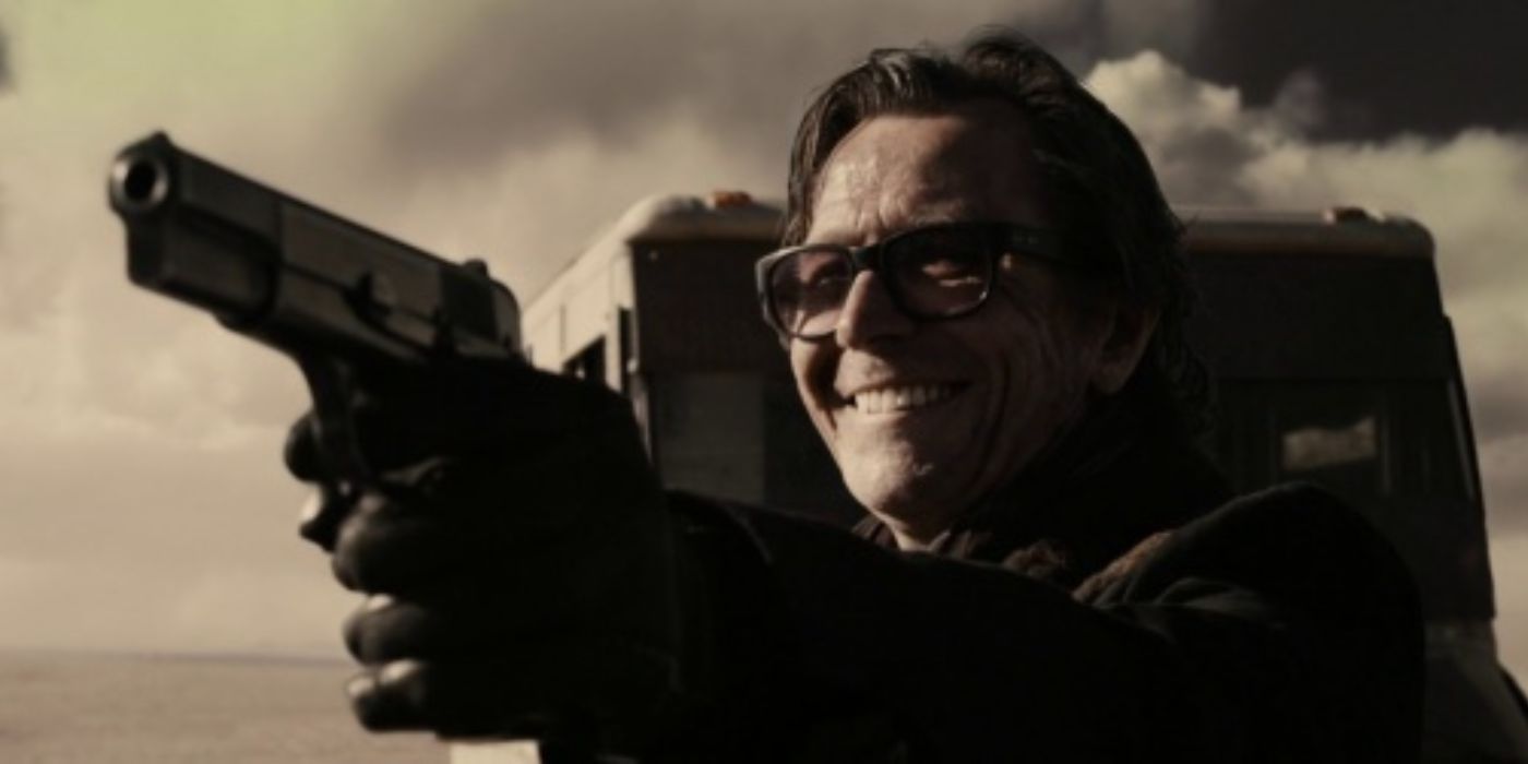 Gary Oldman as Carnegie prepares to shoot an off-screen Eli in The Book of Eli.