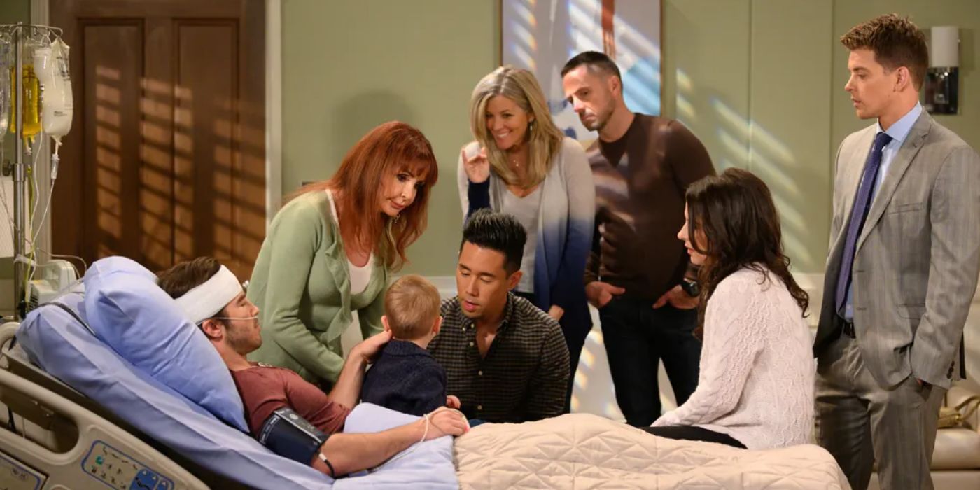 Cast of General Hospital surrounding a hospital bed