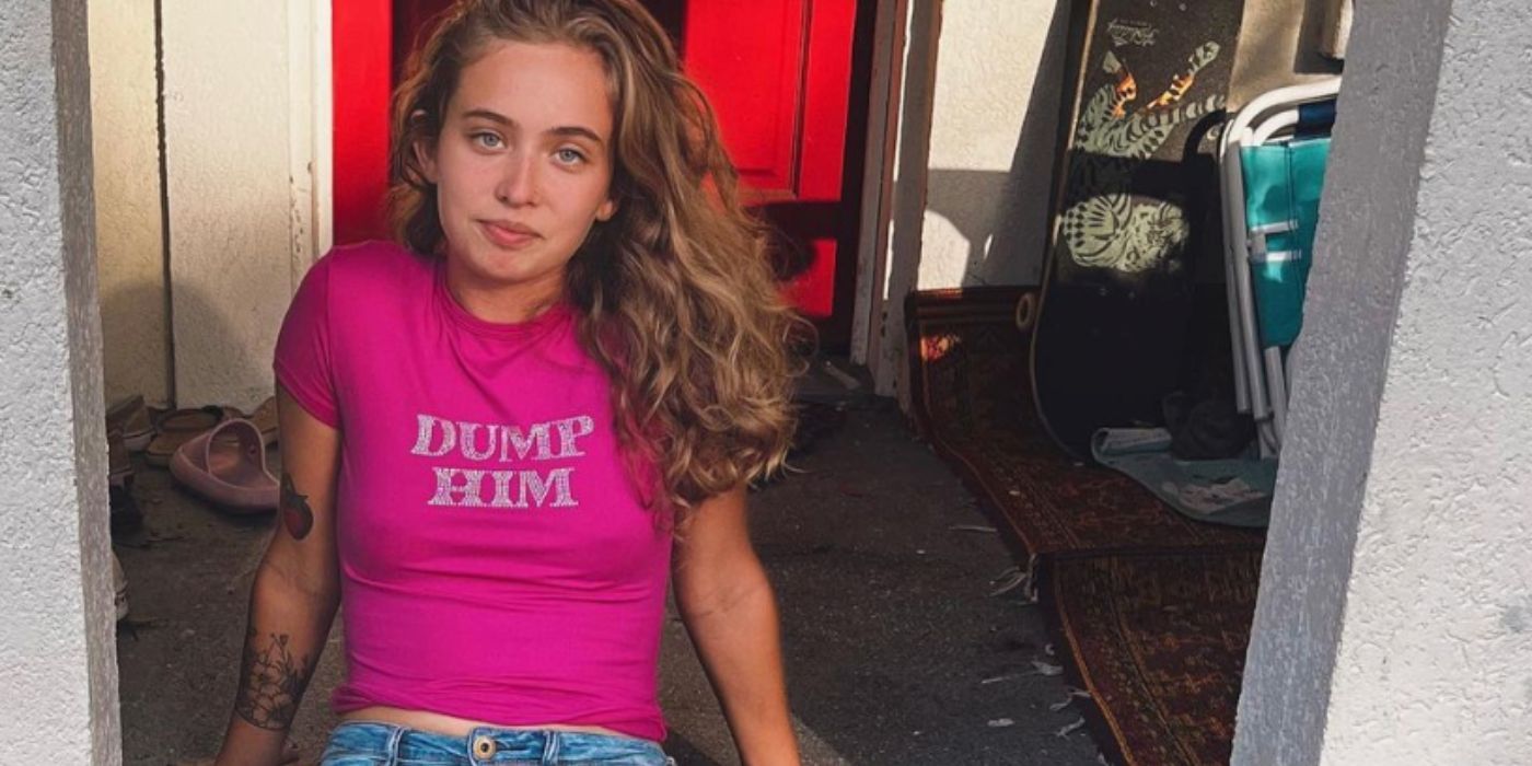 Grace Cottrell from Vanderpump Villa posing in "dump him" t-shirt