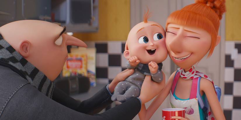 Gru holding the baby up to his wife's face from the Despicable Me 4 movie trailer
