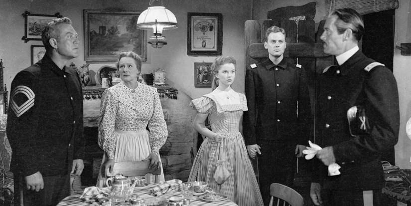 Henry Fonda and Shirley Temple with cast of Fort Apache.
