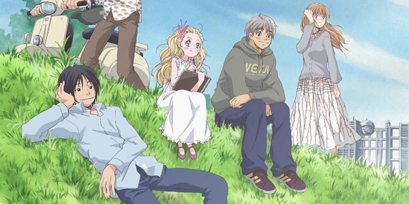 Elenco de anime Honey and Clover sentado na encosta de uma colina gramada.