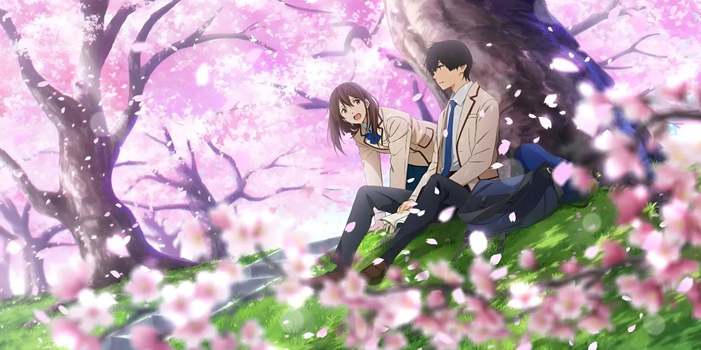 Sakura e Haruki sentam-se sob uma cerejeira em I Want To Eat Your Pancreas.