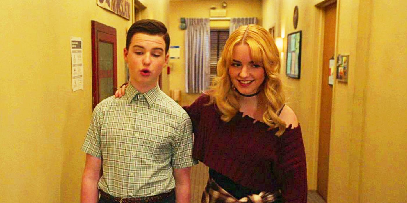 Iain Armitage as Sheldon and McKenna Grace as Paige walking and talking in Young Sheldon