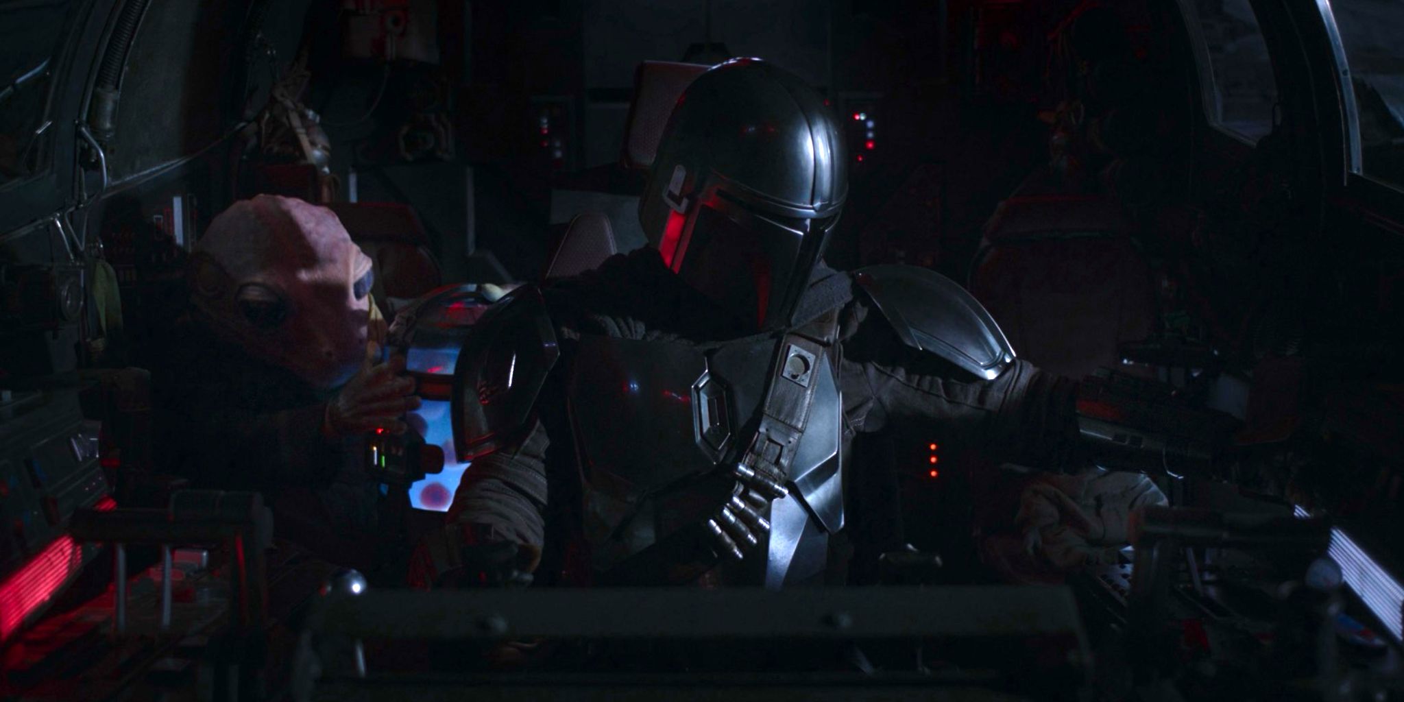 Din Djarin, Frog Lady, and Grogu all sit in the Razor Crest cockpit in The Mandalorian season 2, episode 3