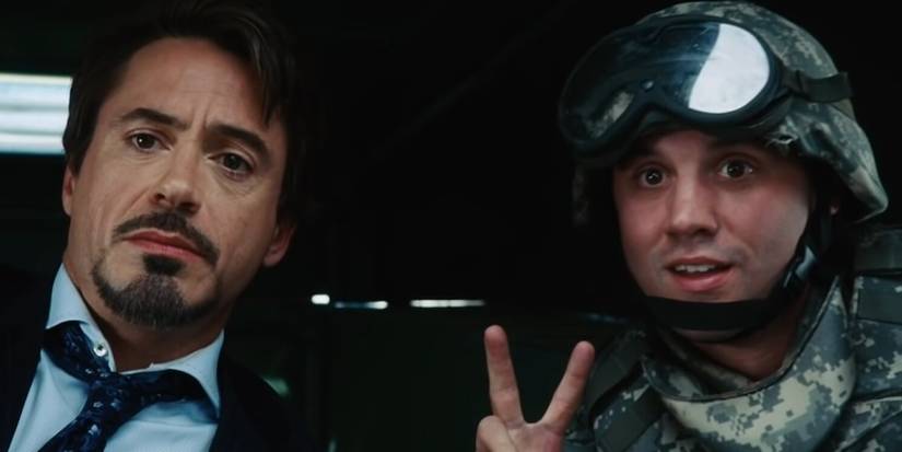 Tony Stark with a soldier in Iron Man