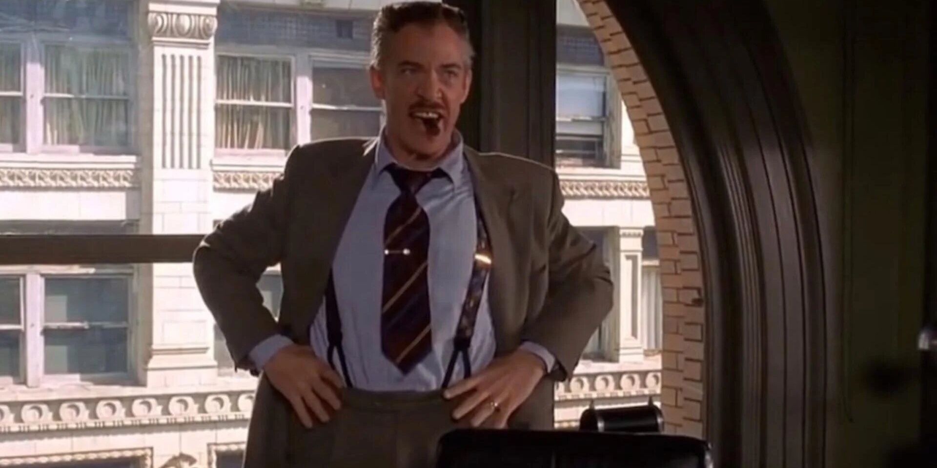 J.K. Simmons as J. Jonah Jameson in Spider-Man smoking a cigar