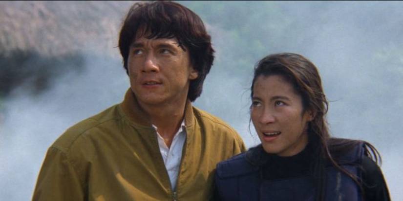 Jackie Chan as Kevin stands beside Michelle Yeoh as Jessica in Police Story 3: Supercop.