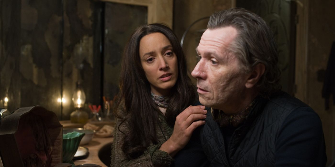 Jennifer Beals as Claudia and Gary Oldman as Carnegie in The Book of Eli.