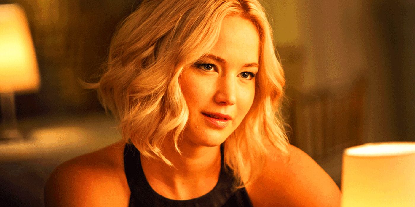 Jennifer Lawrence sitting at a table in Passengers