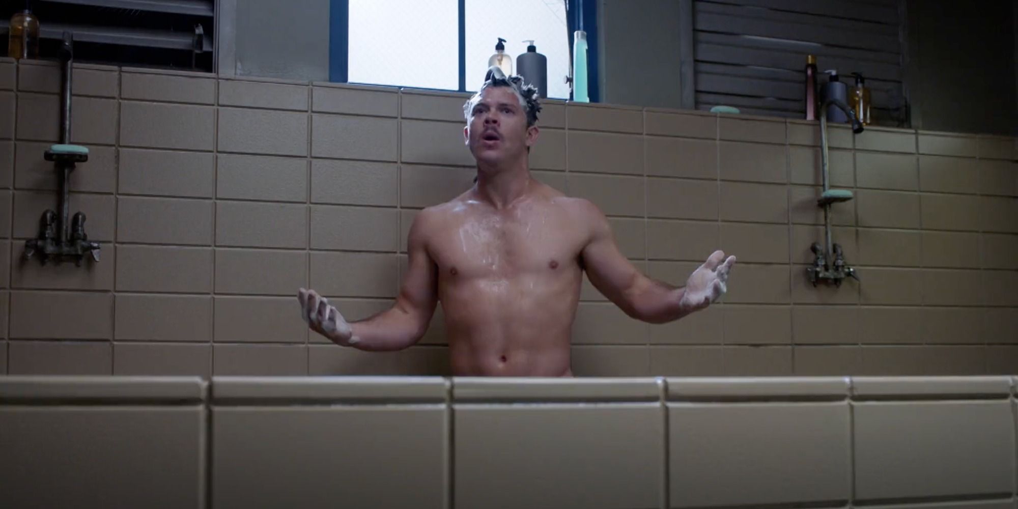 Jimmy Tatro as Sergeant Shuck in the shower in Tacoma FD