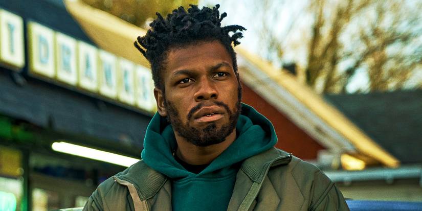 John Boyega looks confused as Fontaine in They Cloned Tyrone