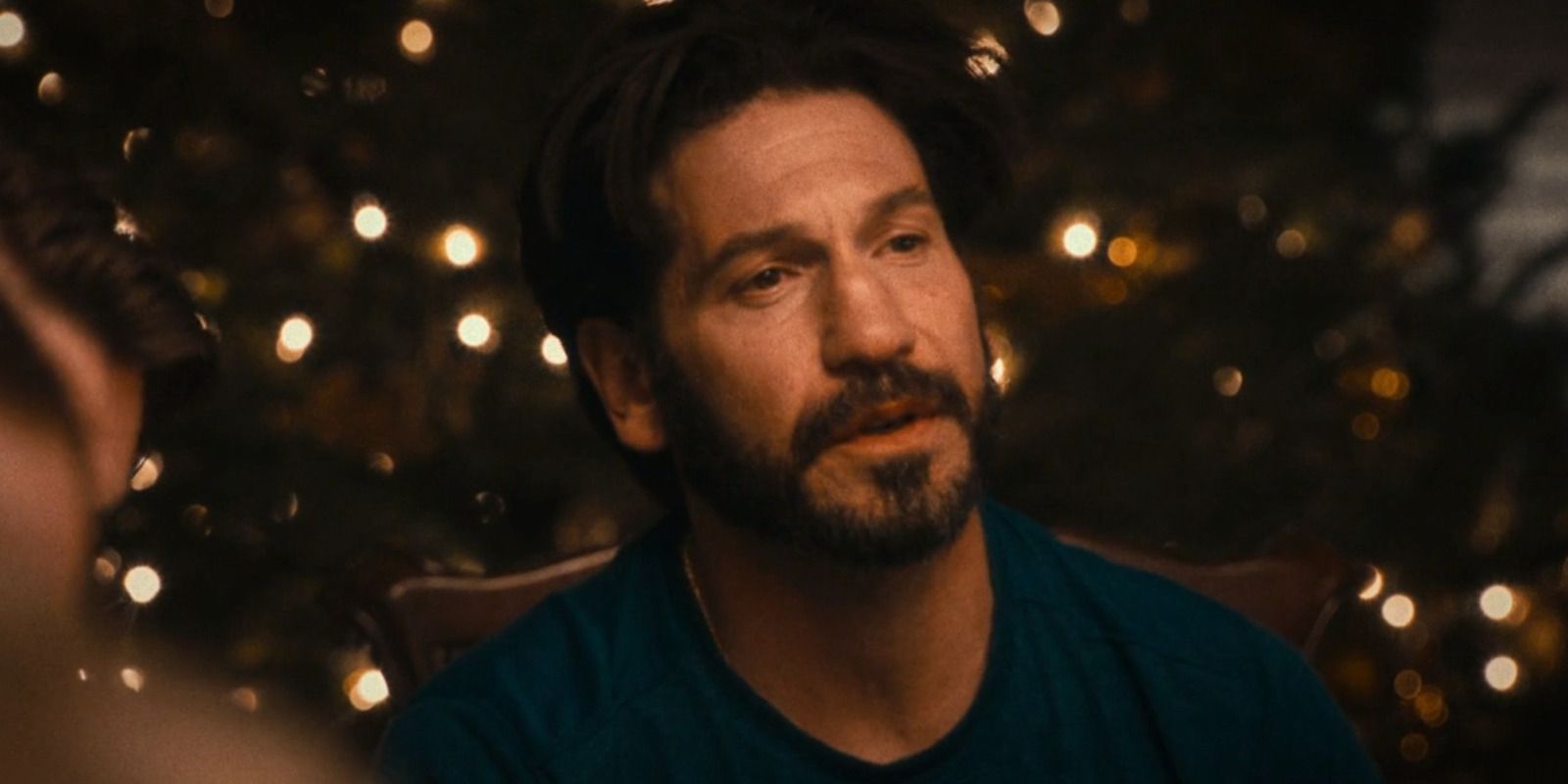 Mikey Berzatto (Jon Bernthal) looking sad at the table in The Bear season 2, episode 6, "Fishes."