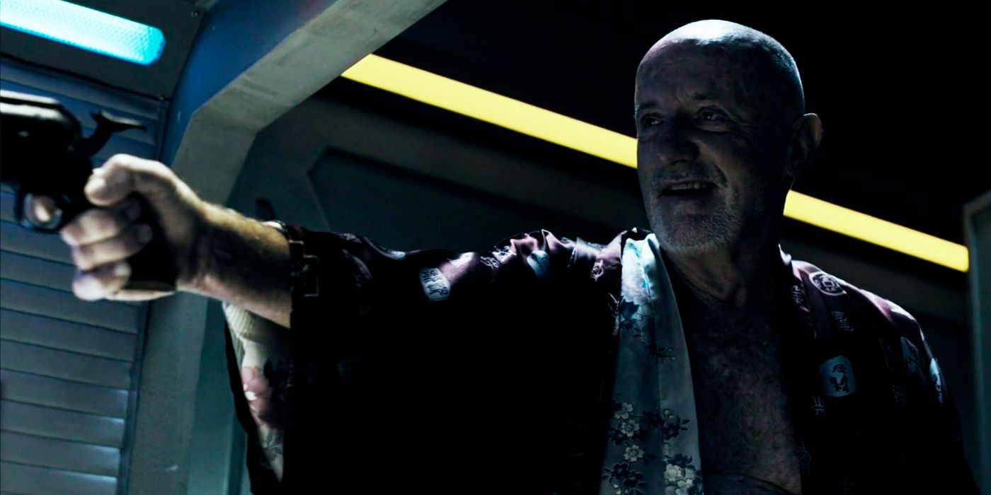 Jonathan Banks As Canterbury's XO Holding A Gun In The Expanse