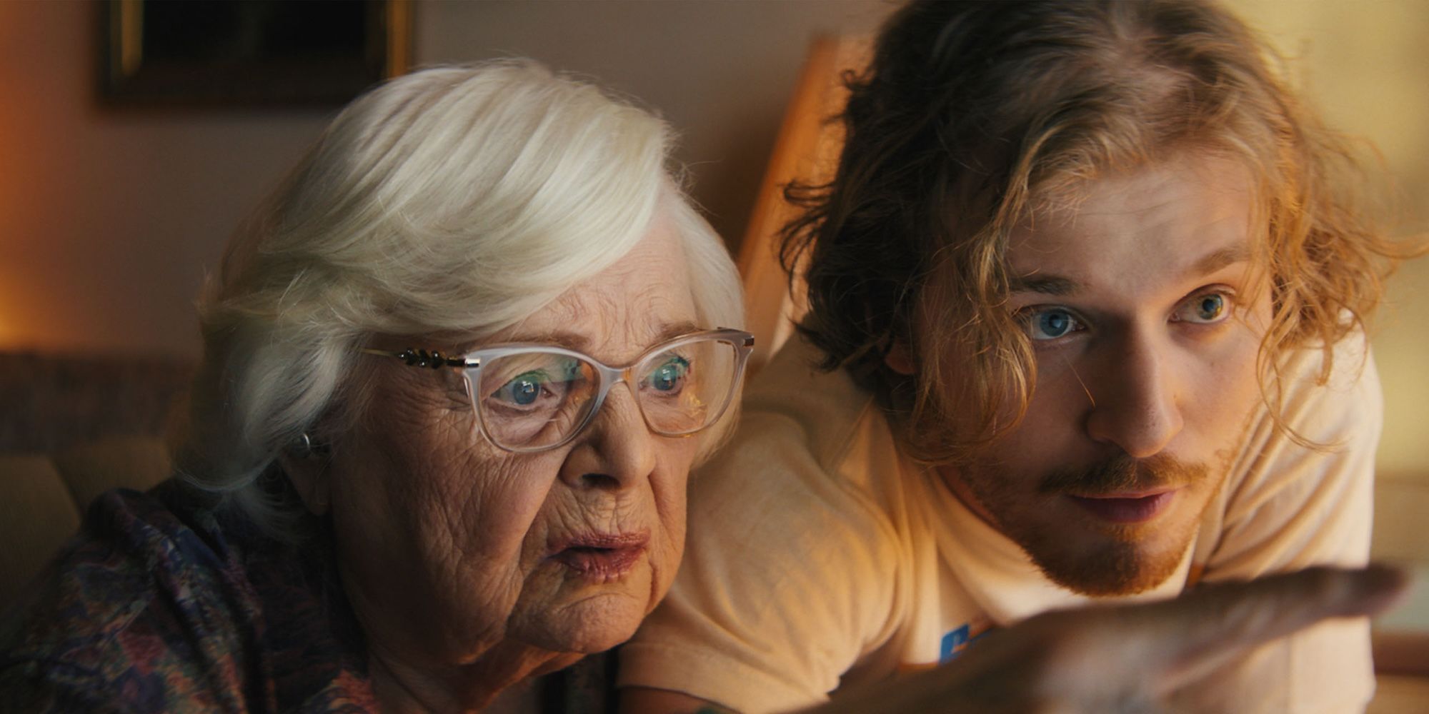 June Squibb and Fred Hechinger peer at the computer screen in Thelma