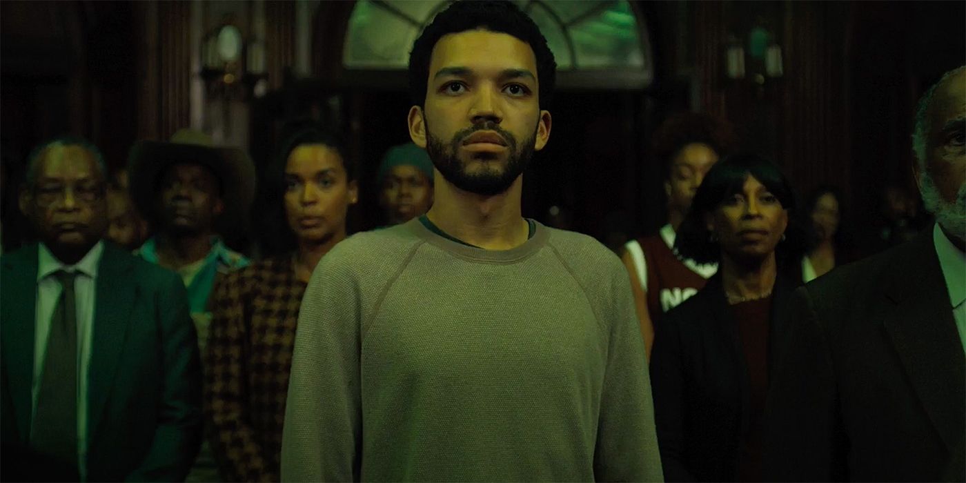 Justice Smith standing in a crowd in The American Society of Magical Negroes