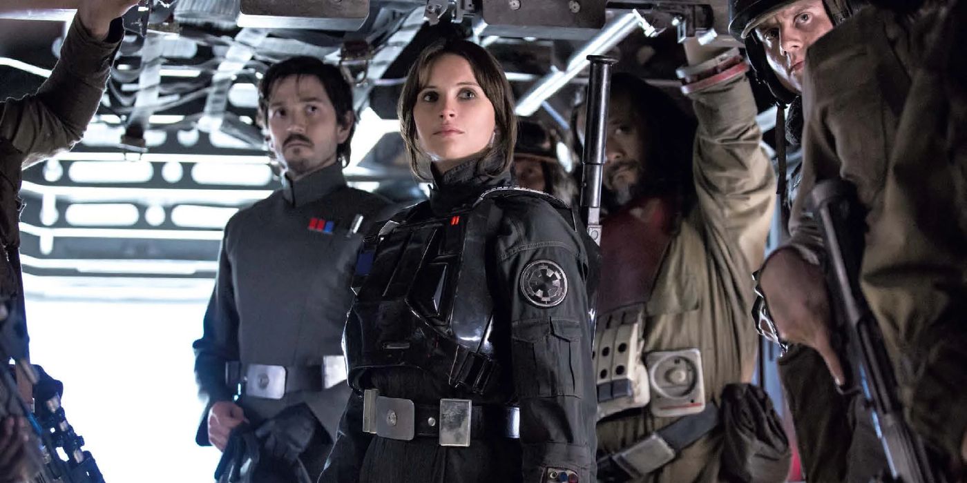 Felicity Jones as Jyn Erso and Diego Luna as Cassian Andor wear Imperial disguises in Rogue One
