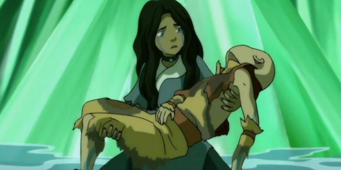 Katara holds Aang after Azula strikes him with lightning