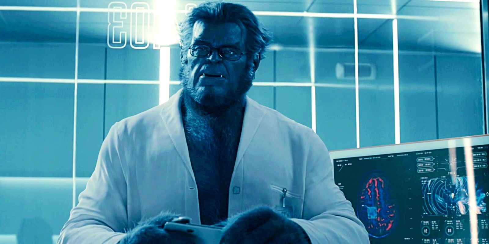 Kelsey Grammer como fera em um jaleco em um laboratório do QG dos X-Men nas maravilhas