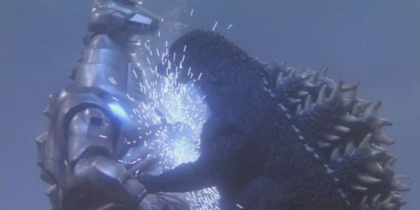 Kenpachiro Satsuma as Godzilla bites Wataru Fukuda as MechaGodzilla in Godzilla vs. Mechagodzilla 2.