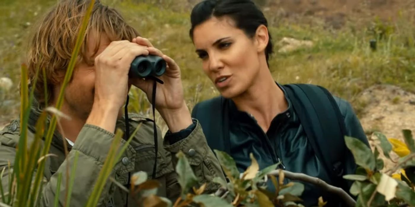 Kensi (Daniela Ruah) yelling at Deeks (Eric Christian Olsen) while he looks through binoculars in NCIS LA season 4 episode 24.