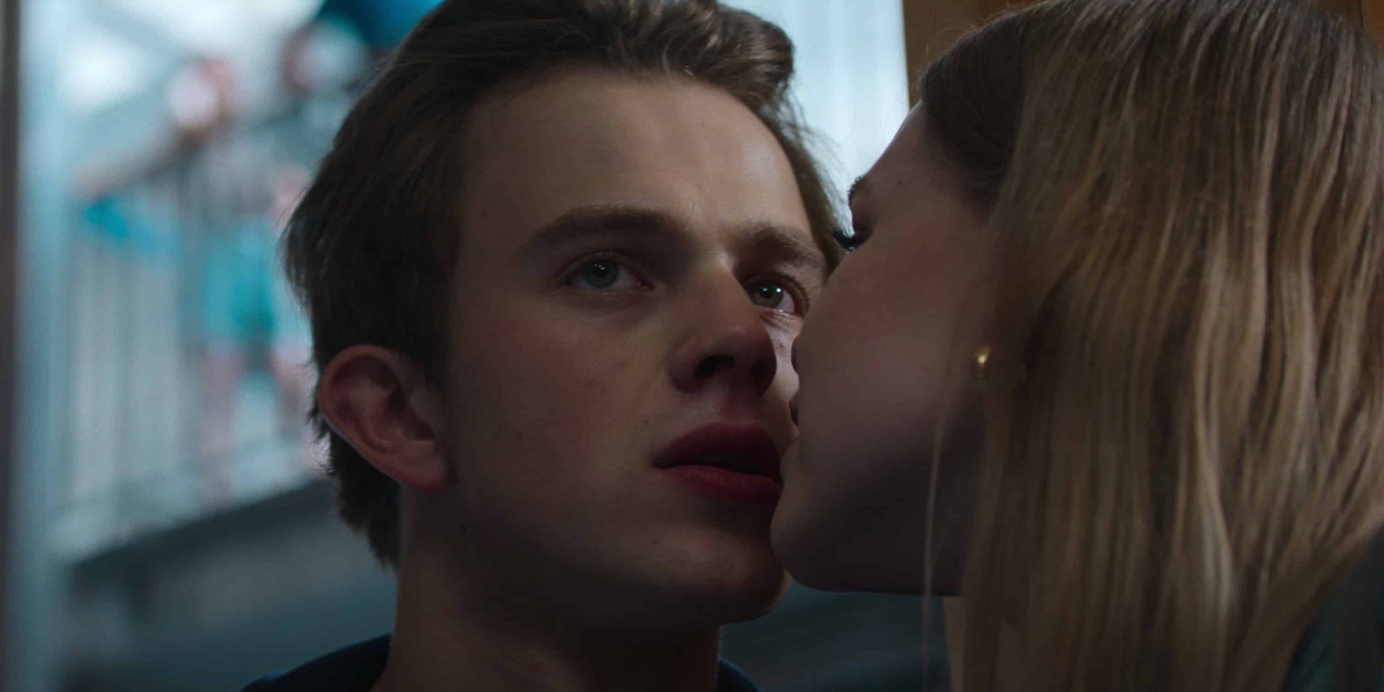 Krzysztof Oleksyn kissing in Hold Tight.