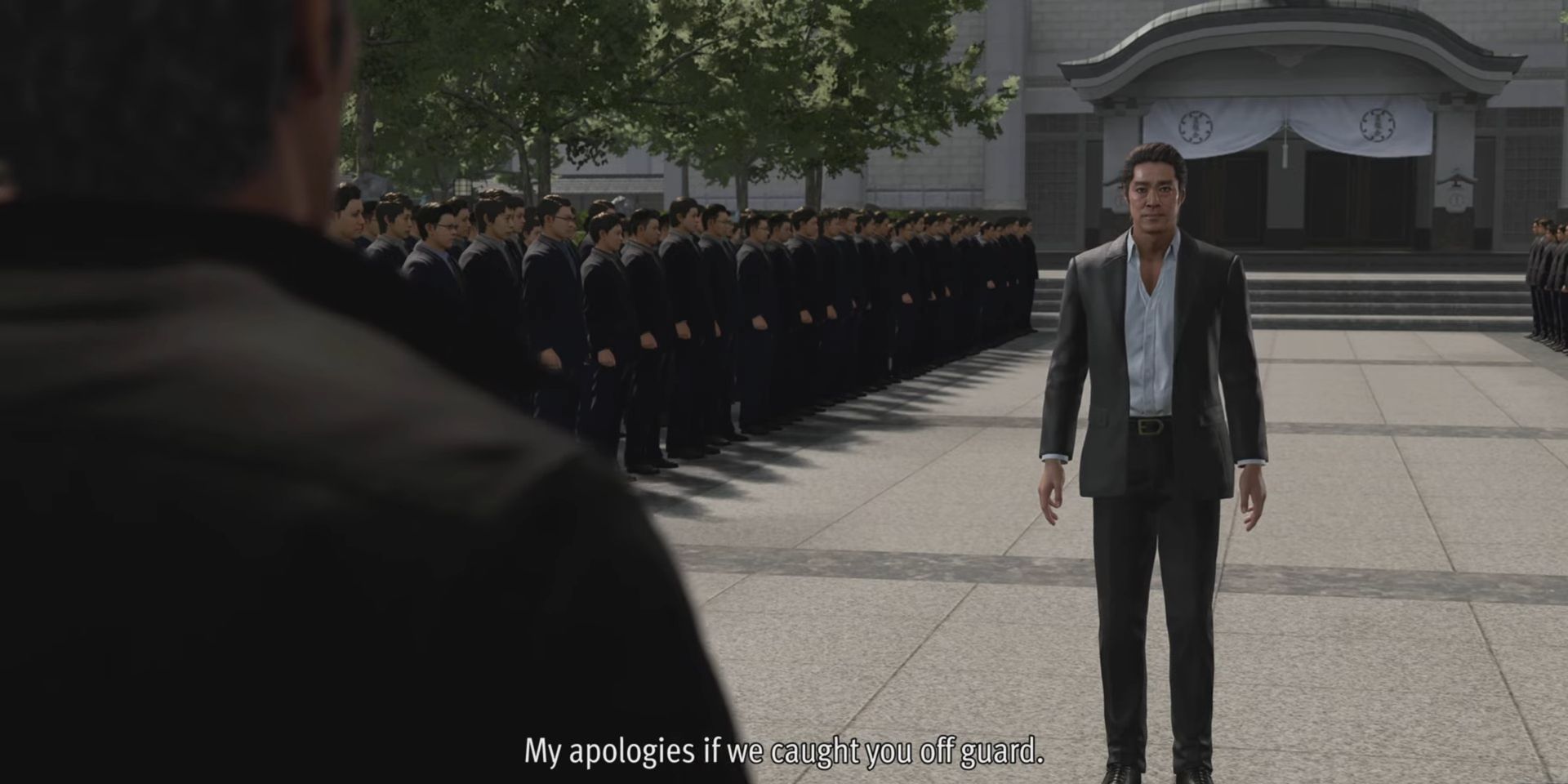 Narasaki greets the party outside the Seiryu Clan's HQ, flanked by lines of underlings. The subtitles read, 