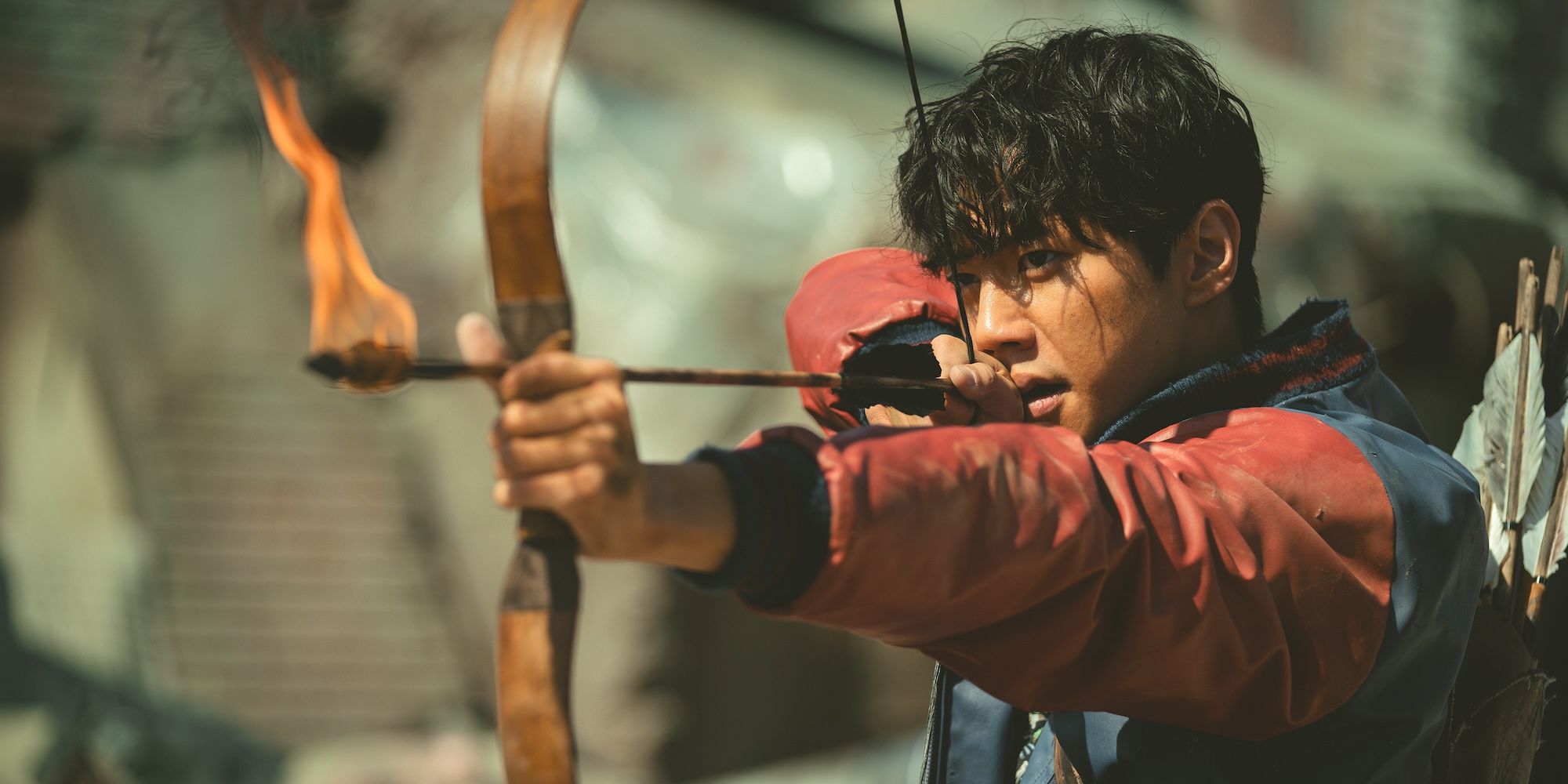 Lee Jun-young shoots an arrow in Badland Hunters