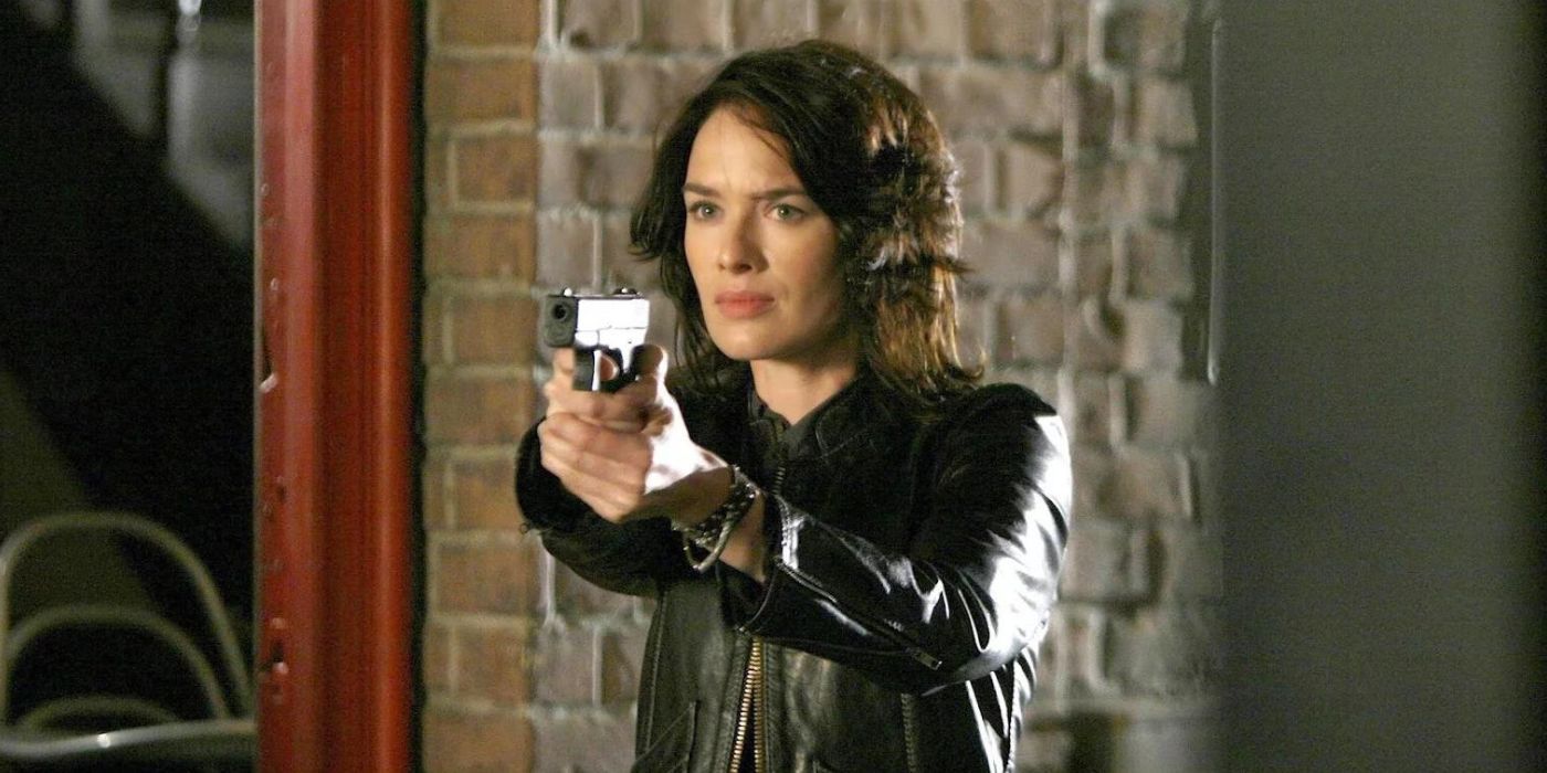 Lena Headey as Sarah Connor holds a gun in The Sarah Connor Chronicles