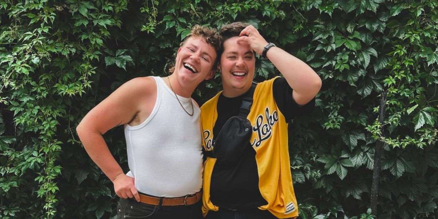 Leon brown and audrey kriss Sister Wives posing happily in front of a hedge