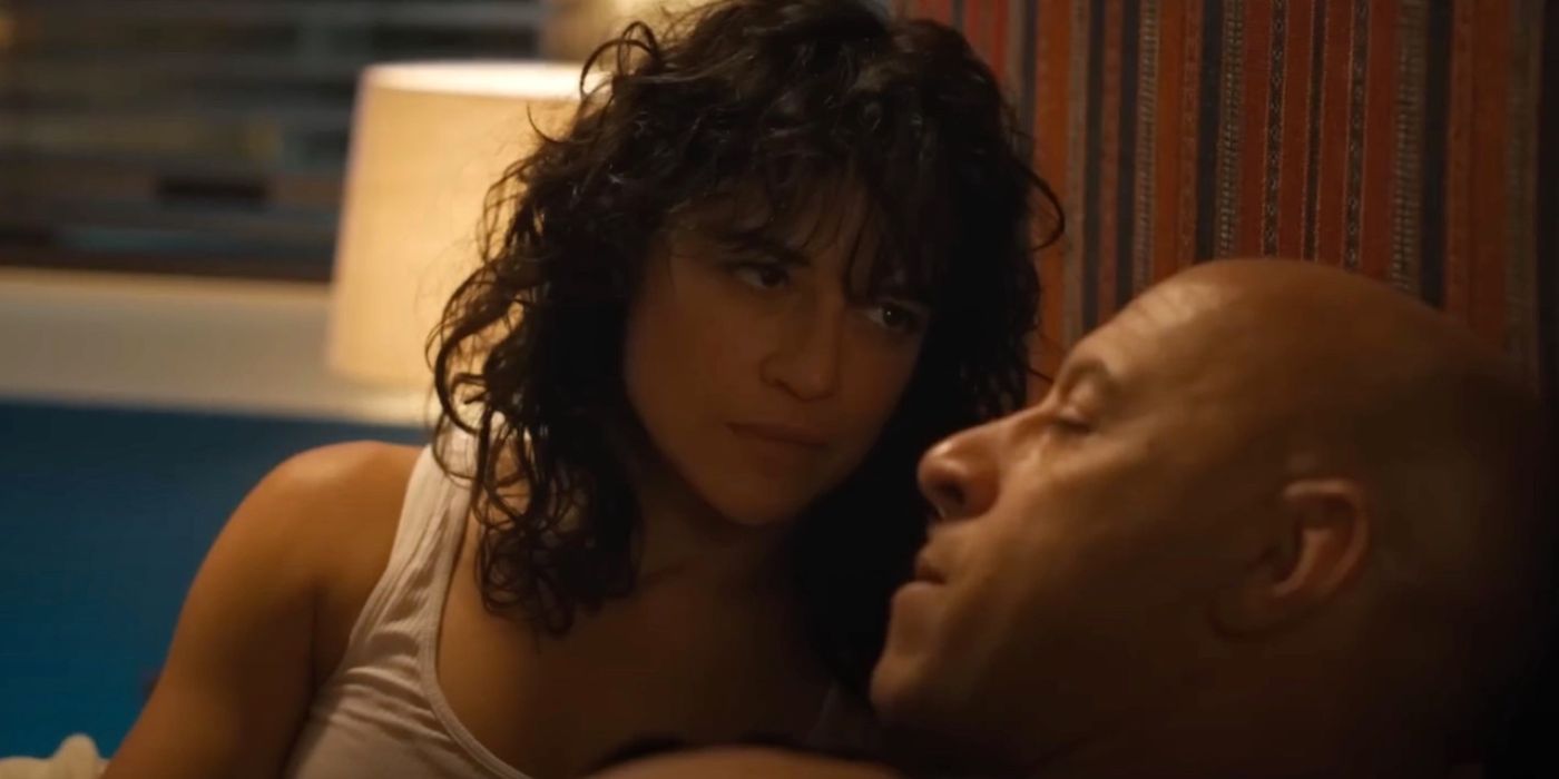 Letty (Michelle Rodriguez) and Dom Toretto (Vin Diesel) tallking in bed in Fast X