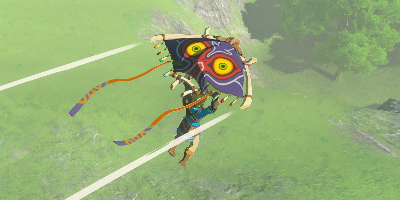 Link uses his Paraglider in The Legend of Zelda: Breath of the Wild.